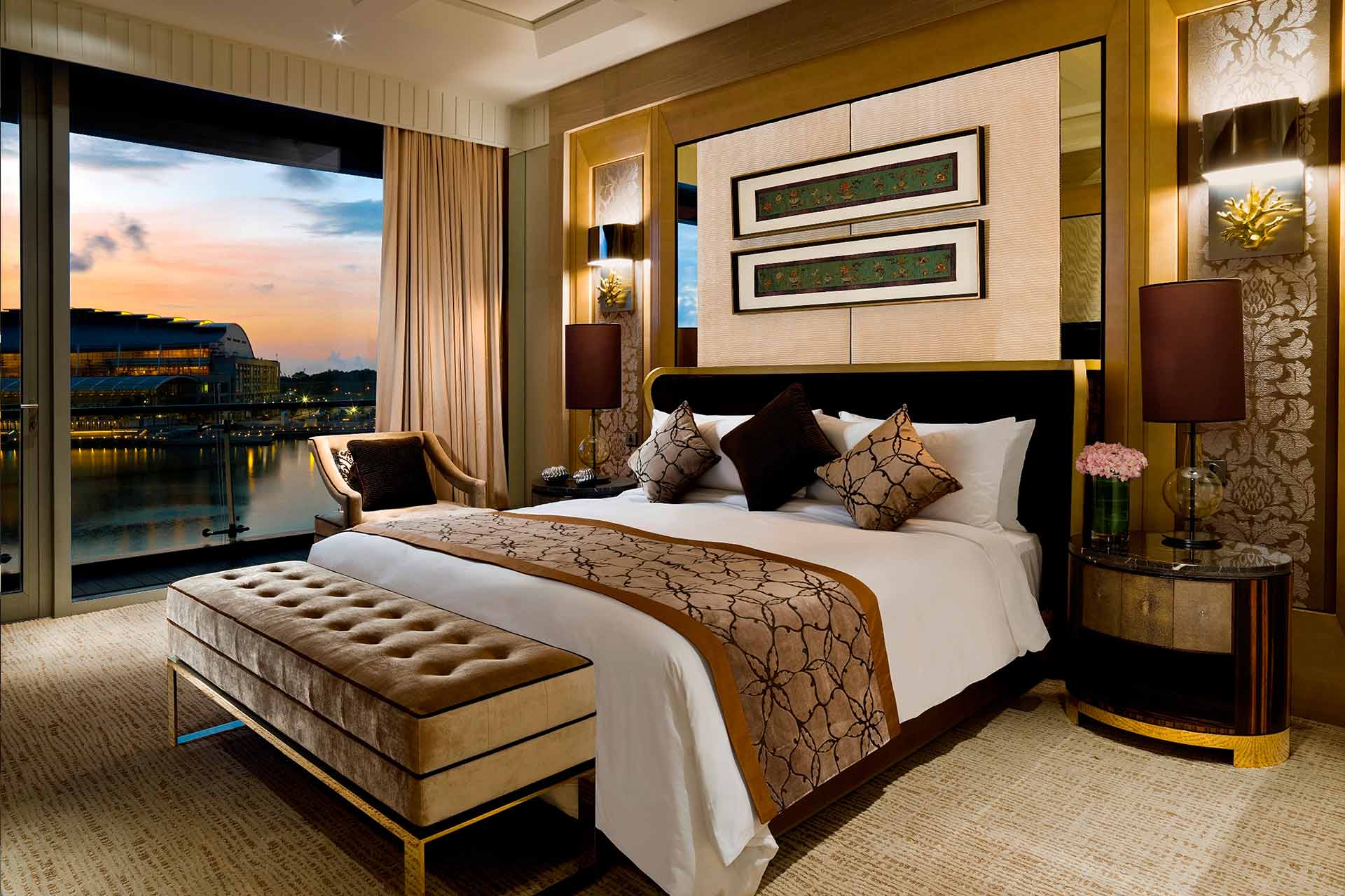 Suite with a king bed and a balcony view